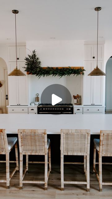 Lindsey Dalton on Instagram: "Nothing like a little Christmas decor to spice up the kitchen, so I tried the vertical garland trend on our range hood. First, I secured several faux stems to last year’s cedar garland. Then, for a touch of whimsy, I finished the plume with a faux branch. #ltkhome #targetfinds #hearthandhand #targetstyle #christmasdecor #christmastime #holidayseason" Vertical Garland, Cedar Garland, Faux Stems, Faux Branches, Hearth And Hand, Target Style, Range Hood, Spice Up, I Tried