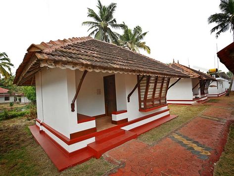 Kerala cottages   Perfect blend of comfort and elegance, these are the words that describe Kerala cottages in the truest sense. We offer 8 individual cottages each containing two independent rooms that are equipped with air conditioning to ensure maximum customer satisfaction. Themed around traditional kerala architecture, these cottages exhibit a certain charm that is simple yet stylish Kerala Architecture, Lake Resort, Best Resorts, Studio Apartment, Eclectic Home, Kerala, Cool Rooms, Gazebo, Family Room