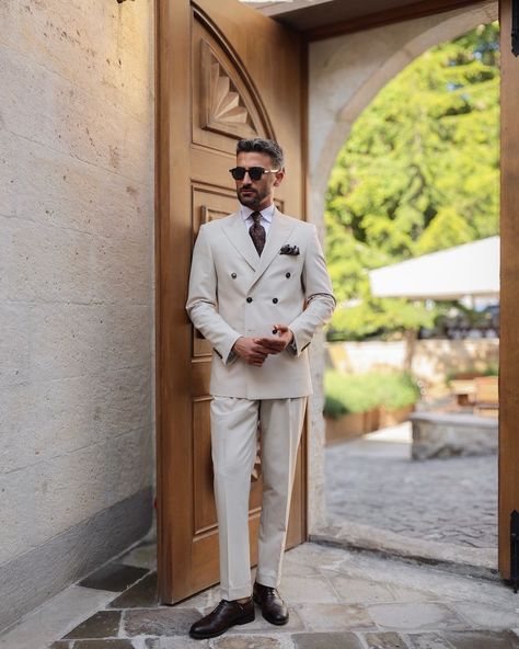 Whopping Road ✨ The tailored slim-fit cream double-breasted men’s suit with peak lapels is a sophisticated and eye-catching ensemble. The rich cream colour exudes elegance and adds a touch of opulence to any occasion. The slim-fit silhouette provides a modern and streamlined look, while the double-breasted design and peak lapels offer a classic and refined touch. This suit is perfect for formal events, weddings, or any occasion where you want to make a statement. With its impeccable tailorin... Cream Colour Suit For Men, Cream Wedding Suit, Mens Suits Summer, Black Pinstripe Suit, Cream Wedding, Cream Colour, Pinstripe Suit, Wedding Suit, Men’s Suits