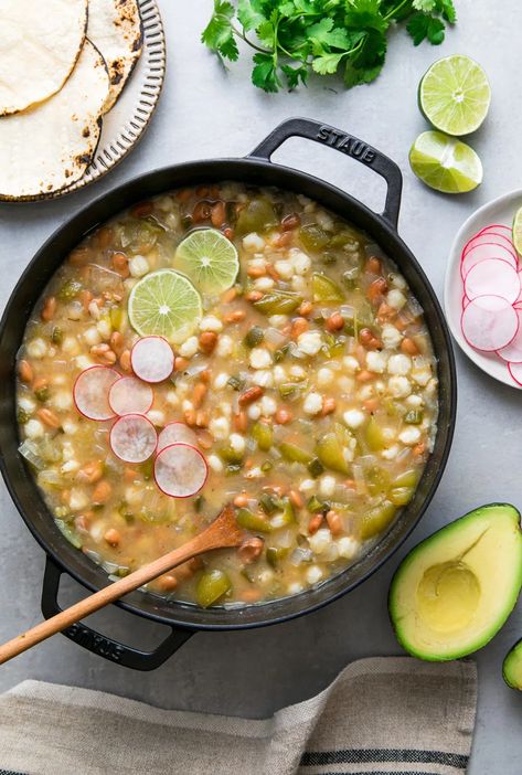 This vegan Posole Verde recipe is made with pinto beans, hominy, tomatillos and jalapeno for a delicious and vibrant flavorful Mexican main dish perfect for a hearty and delicious lunch or dinner! Stovetop, Instant Pot or Slow Cooker! #posoleverde #healthyrecipes #veganrecipes #plantbased Vegetarian Posole Recipe, Vegetarian Posole, Vegan Pozole Recipe, Vegan Posole, Posole Verde Recipe, Vegan Pozole, Simple Veganista, Posole Recipe, Mexican Main Dishes