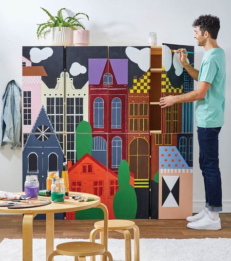 Painted Cityscape Mural on Wall of Cabinets City Mural, Town Mural Ideas, City Theme Playroom, City Wall Mural, Diy City Skyline Wall, Cityscape Mural, City Scape Wall Mural, Solo Camping, Free Lego