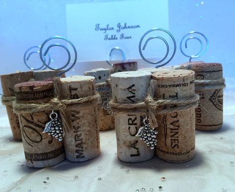 "Set of 10  These wine cork place card holders are sure to be a hit at your special gathering! From my treasured collection of wine corks gathered over the years, I have chosen a variety of wine corks with interesting names, logos, and brand marks (no really cheap wines!) to make into these fun place card holders. Each holder will be made with 3 different corks. Each holder will be unique, no two alike. You will receive 10 of these holders.  *Great for weddings, rehearsal dinners, parties, and w Wine Cork Place Card Holders, Cork Place Card Holders, Wine Cork Place Card Holder, Rustic Rehearsal Dinners, Table Numbers Wedding Rustic, Wedding Guest Table, Wine Event, Unique Party Favors, Menu Holders