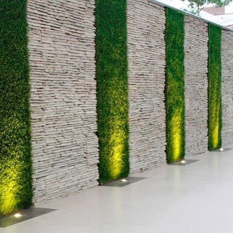 Go crazy with this Boundary wall decor !!! #naturalstone #wallcladding by #stoneideas ... #homedecor #udaipur #tiles #walltiles #decorations #nature #indianstone www.stone-ideas.in Moderne Have, Garden Lighting Design, Stone Walls Garden, Vertical Garden Design, Landscaping Flowers, Desain Lanskap, Vertical Gardens, Walled Garden, Outdoor Gardens Design