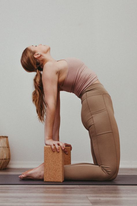 Camel pose yoga asana with yoga blocks Yoga Props Photography, Yoga Props Aesthetic, Yin Yoga With Blocks, Yoga Blog Post Ideas, Meditation Photoshoot Ideas, Warmup Stretches, Yoga With Props, Athletic Poses, Kettlebell Workouts For Women