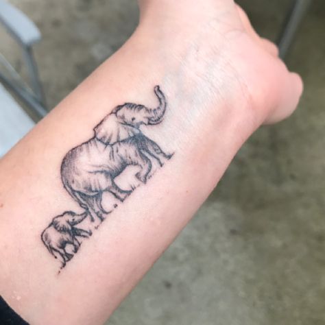 Elephant tattoo, mother and son Mother Son Tattoo, Elephant Tattoo Meaning, Tattoos About Growth, Tattoo Elephant, Son Tattoos, Mother And Son Tattoo, Small Wave Tattoo, Mother Son Tattoos, Mother Daughter Tattoo