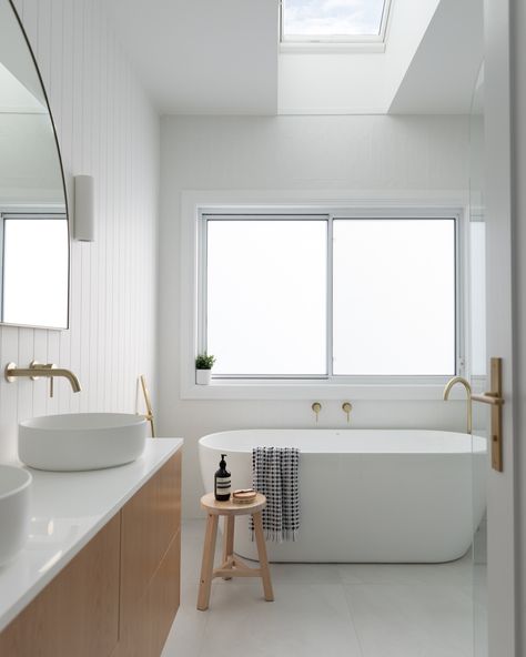 Three bathroom creations from our Renwick project. The main bathroom, ensuite and loft bathroom, each thoughtfully designed with skylights, timber vanities and wall paneling, creating a serene and inviting atmosphere. Perfect blend of modern design and timeless charm. Builder: @stewart_constructions Plumber: @belmoreplumbing 📸: @life.instill #custombuilder #bathroomdesign #southernhighlandsbuilder #bathroomskylight Skylight Design Bathroom, Timber Vanities, Bathroom Skylight, Skylight Bathroom, Skylight Design, Timber Vanity, Beach House Bathroom, Bathroom Ensuite, Home Extension