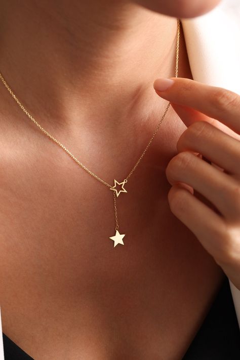 Star Charm Necklace, Tiny Star Necklace,  Super Star Necklace, Star Choker, Stars Necklace, Layering Necklace, Gift for her, christmas gift STAR NECKLACE Dainty gold star lariat necklace, perfect to wear by itself for a minimal look or layer it up with other necklaces. Our products are carefully prepared by our company from 925 Sterling silver. We offer you years of experience, product and service quality. FINISHED COLOR: Silver - Gold - Rose Gold Necklace length: 14 INCHES 15 INCHES 16 INCHES 17 INCHES 18 INCHES 19 INCHES 20 INCHES 21 INCHES 22 INCHES This necklace is the perfect gift for you loved ones. We wish you to use our products on happy days. Please visit my store for my other items. https://www.etsy.com/shop/onixjewellry Thank you so much for visiting and hope you enjoy shopping Gold Star Jewelry, Necklaces Star, Tiny Star Necklace, Gold Star Necklace, Star Choker, Stars Necklace, Necklace Star, Star Necklace Gold, Star Charm Necklace