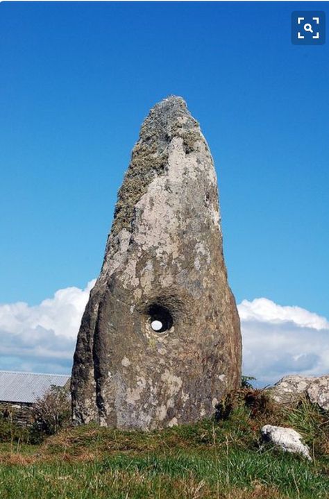 Cape Clear Island. One of two standing stones which has a hole through it where couples are believed to have joined hands in a marriage ceremony in prehistoric times perhaps around 1200BC. There were originally 4 standing stones on the site but two of them have fallen. Viking Ideas, Ancient Ireland, County Cork Ireland, Stone Circles, County Cork, Standing Stones, Ireland Trip, Standing Stone, Cork Ireland