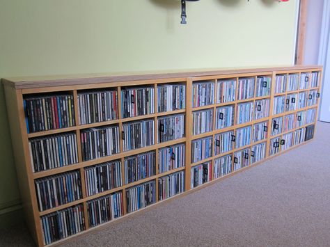 Materials: Billy Bookcase (80x202cm), 6 x Billy CD inserts, 24mm birch faced ply I kept my CD collection in a Billy bookcase for which I’d purchased the CD inserts (I think these are now discontinued). I’ve redecorated my home office and didn’t want the tall bookcase; I wanted to hang guitars on the wall, and this [&hellip Ikea Cd Storage, Painting Particle Board Furniture, Vhs Storage, Lp Regal, Cd Shelves, Billy Ikea, Billy Bookcases, Dvd Shelves, Ikea Bookshelves