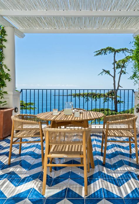 A Tile Area Rug Is Just One Idea We’re Stealing From This New Amalfi Coast Hotel | domino Italian Beach House, Amalfi Coast Hotels, Sorrento Hotel, Italian Beach, Mid-century Interior, Bathroom Big, Chevron Tile, Italian Beaches, Open Concept Layout