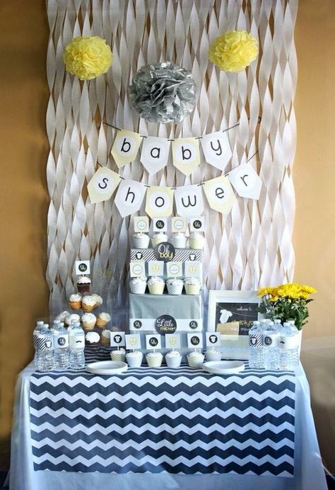 here's another idea for a backdrop. twist crepe paper & tape each end so it holds the twisted shape. this would be cute, easy and cheap Yellow Baby Shower Decorations, Bos Baby, Babyshower Party, Grey Baby Shower, Diy Baby Shower Decorations, Baby Shower Theme Decorations, Baby Shower Yellow, Baby Shower Table, Shower Inspiration