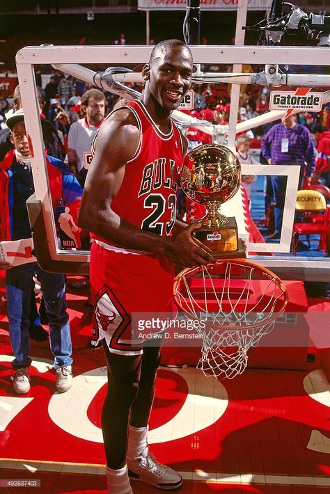 Michael Jordan #23 of the Chicago Bulls poses with the trophy after winning the 1988 Slam Dunk Contest as part of All-Star Weekend on February 6, 1988 at Chicago Stadium in Chicago, Illinois . Michael Jordan Images, Mike Jordan, Michael Jordan Art, Dunk Contest, Michael Jordan Photos, Michael Jordan Pictures, Jordan Bulls, Nba Basketball Art, Art Football