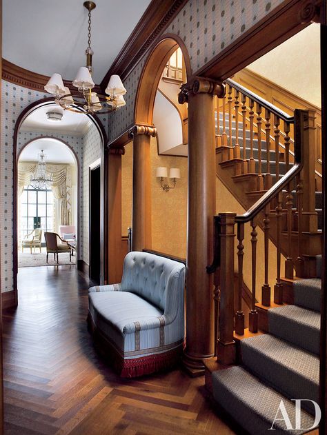 Architect Peter Pennoyer added columns and classical details to the staircase and landing of a New York City townhouse decorated by Jeffrey Bilhuber. Read on for more chevron and herringbone floors. Peter Pennoyer, Jeffrey Bilhuber, Townhouse Decorating, New York Townhouse, Herringbone Flooring, Traditional Staircase, Interior Columns, Herringbone Floor, Classic Home Decor