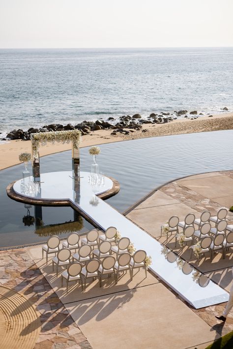 A fairytale setting for an intimate wedding that celebrates a true love story. Micro Wedding Ideas Beach, Destination Wedding Colors Beach, Beach Wedding Intimate, Micro Wedding Beach, Mexico Destination Wedding Decor, Wedding On Water, Cabo Beach Wedding, Cabo Wedding Ideas, Wedding Photo Zone