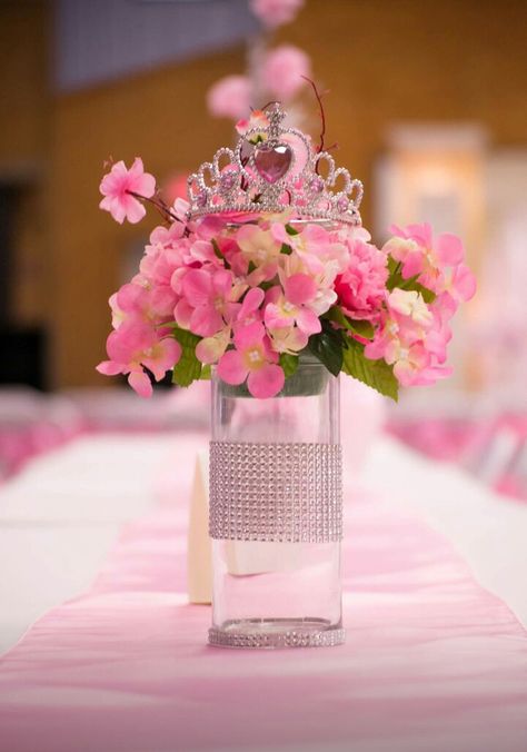 Pink floral centerpieces with tiaras ordered from amazon in pkgs of 12. Flowers,floral foam   and vases from Dollar tree. Rhinestone ribbon bling ordered from Amazon.com. also. Tiara Centerpiece Ideas, Ties And Tiaras Dance Decorations, Pink Floral Centerpieces, Sweetheart Dance, Baby Shower Princess Theme, Dance Decorations, Bling Ideas, Rhinestone Ribbon, 15 Birthday