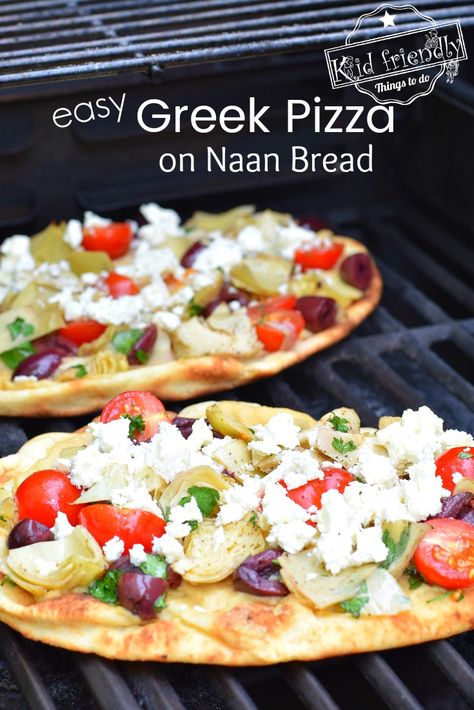 The best Greek Pizza Recipe. Easy to make on Naan (flatbread). Loaded with hummus, Feta cheese, Greek Olives, Delicious Artichokes and more. It's so easy to make and sure to be a big hit! www.kidfriendlythingstodo.com #greekpizza #pizza #grilled #easy #best #hummus #feta Naan Bread Pizza Recipe, Greek Pizza Recipe, Pizza Recipe Easy, Naan Bread Pizza, Flatbread Pizzas, Naan Pizza Recipes, Pain Naan, Greek Pizza, Naan Flatbread