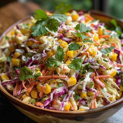 Bring a burst of vibrant flavors to your table with "Fiesta Flavor: Mexican Street Corn Coleslaw." This unique twist on traditional coleslaw combines the zesty, creamy goodness of Mexican street corn (elote) with the crunchy Mexican Street Corn Coleslaw, Street Corn Coleslaw, Cabbage Cups, Corn Coleslaw, Tangy Coleslaw, Italian Drunken Noodles, Sweet Salads, Cole Slaw, Cotija Cheese