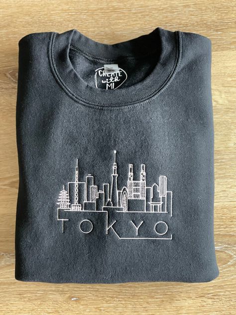 Shop now for your custom skyline embroidered sweatshirt! This cozy sweatshirt is perfect for layering and will keep you warm all winter long. Choose from a variety of colors and styles to find the perfect one for you. #sweatshirt #embroidery . #Embroidery_Design_Shirt #City_Shirt_Design #Embroidery_Designs_For_Hoodie #College_Embroidered_Sweatshirts Tshirt With Embroidery, City Shirt Design, Embroidery Designs For Hoodie, College Embroidered Sweatshirts, Embroidered Sweatshirt Outfit, Embroidery Designs Sweatshirt, Taylor Embroidery, City Embroidery, Crewneck Embroidery