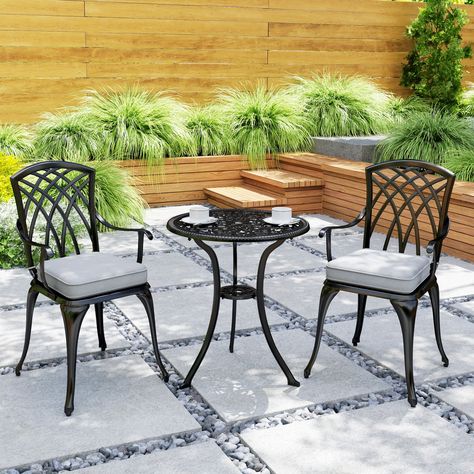 Add some continental elegance to your garden or patio with this stylish and classic bistro set. Including 2 chairs and a matching table, this set is great for dining or drinking in the fresh air. Hand crafted from solid cast aluminium and designed in an exceptional chic style, the balcony table and chairs will enhance your outdoor experience and bring a style to your garden.Features:Three-piece bistro set that includes a round table and two matching chairsMiddle parasol hole table for parasol to Coffee Table For Balcony, Tulips Design, Balcony Table And Chairs, Kids Bedside Table, Table Bistrot, Garden Table And Chairs, Rattan Garden Furniture, Dining Furniture Sets, Garden Dining Set