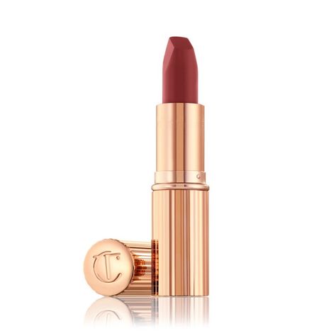 Matte Revolution in Walk of No Shame lid removed Charlotte Tilbury Walk Of No Shame, Charlotte Tilbury Walk Of Shame, Walk Of No Shame Lipstick, Berry Red Lipstick, Brown Nude Lipstick, Perfect Lipstick Shade, Makeup Inventory, Makeup Charlotte Tilbury, Revolution Lipstick