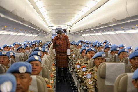 Bhutan’s first UN Peacekeeping Contingent boarded a special Drukair flight to Central African Republic (CAR), today. His Majesty The King and Her Majesty The Gyaltsuen graced the departure ceremony at Paro Airport. A Guard of Honour was presented at the Ceremony. Bhutan’s contingent, which comprises of 180 Royal Bhutan Army Personnel, is part of the United Nations’s Multidimensional Integrated Stabilisation Mission for the Central African Republic (MINUSCA). United Nations Office, United Nations Building, South African Defence Force, United Nations Peacekeeping, United Nations Environment Programme, Central African Republic, Special Force, Defence Force, United Nations