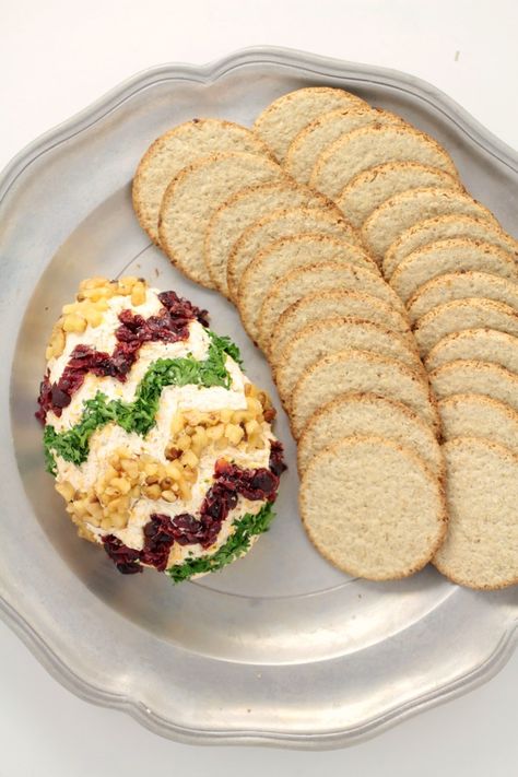 This Easter Egg Cheese Ball is an adorable Easter appetizer that is easy to make and super delicious. Start with a classic cheeseball and decorate for a unique Easter themed appetizer to serve at your Easter dinner party! Easter Egg Cheese Ball, Easter Cheeseball, Desserts Recipes Chocolate, Classic Cheeseball, Easter Appetizer Ideas, Easter Cheese Ball, Bagel Board, Caprese Salad Bites, Easter Cheese