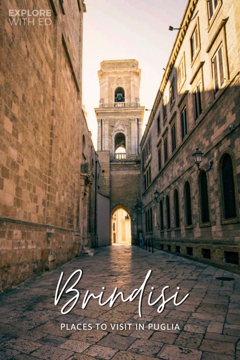 Honey coloured empty street that ends with a tall bell tower and archway. Brindisi Italy, Grad Trip, Appian Way, Places To Explore, City Vibes, Italy Trip, One Day Trip, Italy Photography, Puglia Italy