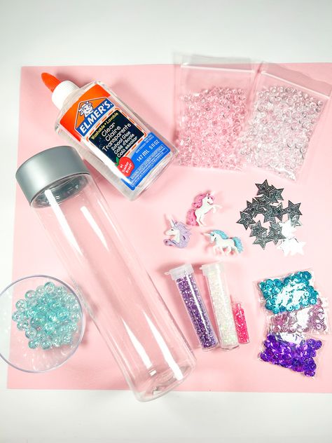 Easy DIY Unicorn Sensory Bottle - In The Playroom Diy Sensory Bottles, Birthday Activities Kids, Diy Unicorn Birthday Party, June Activities, Calm Down Jar, Sensory Beads, Sensory Kits, Calm Room, Sensory Bottle