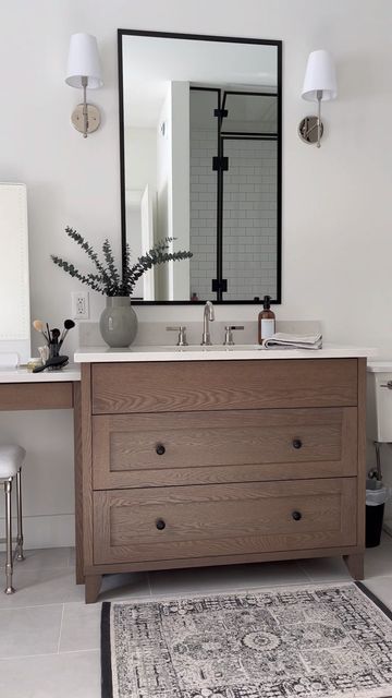 Erin | home building and design on Instagram: "We skipped the double sink for a makeup vanity instead! Would you do the same or would you rather have two sinks? A few pointers to consider when planning bathroom cabinetry: -consider raising your sink cabinet a few inches- it’s more comfortable for washing your face and shaving as you don’t have to bend as far. Bathroom cabinets are generally 30-32”….ours are 34” and they are just right for us -get the biggest sink that you can fit into your Vanity With Makeup Counter, Vanity With Makeup, Ensuite Vanity, Makeup Counter, Bathroom Cabinetry, Double Sink Vanity, Home Building, Sink Cabinet, Would You Rather