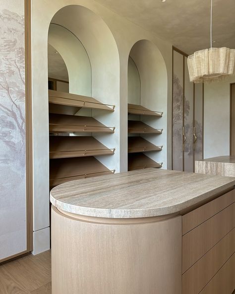 Countertops are in and we are completely in love with this custom walk in closet design 🤍 hidden features below ⬇️ The cabinet doors showcase a custom wallpaper inlay inspired by the property’s natural landscape, which is home to approximately 10,000 plum trees.   We also incorporated a hidden coffee station behind one of the closet doors, complete with a hammered brass sink, allowing our clients to enjoy their morning coffee from the comfort of their bed. To further maximize the closet’s s... Hidden Closet Storage, Gym Closet Organization, Closet Islands, Hidden Coffee Station, Custom Walk In Closet, Walk In Closet Inspiration, Walk In Closet Ideas, Hidden Closet, Plum Trees