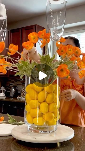 Anna Gandrabur on Instagram: "#tbt 
Who remembers my last year video? 
Lemons aren’t just for lemonade—they can also bring a burst of freshness and vibrancy to your home decor. 
.
.
Your @anya_gc_elegancy 
.
.
#Homeinterior #decorinterior #interiordesigner #interior123 #modernhomedecor #homedecor #likethisdecor #viralpost #fyp #fypage #fyp> #viralvideo #viralreels #homedecorlovers #inspiration #homeinspo4you #desginer #followformorevideos #followformoreposts #viralreels #likethisreel #decorlovers #decoration #homeinspodaily #lemonsdecor #kitchenislanddecor" Island Centerpiece Ideas, Lemon Table Decor, Lemon Centerpieces, Fruit Centerpieces, Easter Flower Arrangements, Summer Centerpieces, Spring Table Decor, Kitchen Island Decor, Home Floral Arrangements