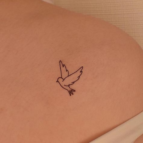 Dove With Halo Tattoo, Aesthetic Dove Tattoo, Dove Tattoo On Hip, Simple Mockingbird Tattoo, Simple Bluebird Tattoo, Minimal Dove Tattoo, Dove Small Tattoo, Small Bird Tattoos For Women Simple, Fineline Dove Tattoo