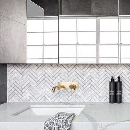 Groove Tiles & Stone on Instagram: "Vanity splashback feature \\ Introduce a timeless element of texture and pattern to your splashback surface with our Carrara Marble Herringbone mosaic. In stock now." Vanity Splashback, Herringbone Splashback, Marble Herringbone, Texture And Pattern, Carrara Marble, Marble Pattern, Apartment Ideas, Herringbone, Kitchens