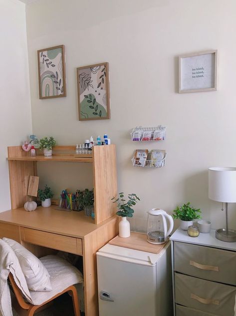 dorm, college, wall art, cream, cozy, white, fridge, nightstand, organization, plants Dorm Room Neutral Aesthetic, Desk Organization Ideas Aesthetic Dorm, 2023 Dorm Room Ideas, Organic Dorm Room, Minimal Dorm Decor, European Dorm Room Aesthetic, College Bathroom Decor Dorm Room Organization Ideas, Cute Simple Dorm Rooms, Aesthetic Collage Dorm Room Ideas