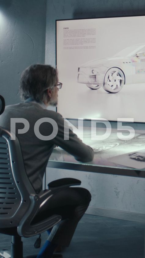 Automotive Designer Works Using Touch Screen Table Looks At The Image Of The Car Touch Screen Table, Ad Car, Childrens Music, Stock Video, Stock Footage, Touch Screen, It Works, Screen, Music