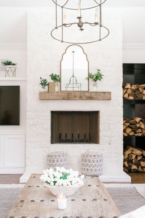 A Coastal Farmhouse in White Done SO Right Read More: https://www.stylemepretty.com/living/2018/07/16/a-coastal-farmhouse-in-white-done-so-right/ Farmhouse Fireplace Ideas, Coastal Farmhouse Living Room, Living Room Reveal, Farmhouse Fireplace, Farmhouse Remodel, Coastal Living Rooms, Fireplace Makeover, Coastal Farmhouse, Natural Home Decor