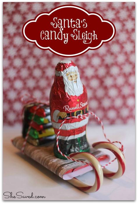 Santa Candy Sleigh Christmas Craft  What a fun way to announce Santa’s arrival with this load of sweet treats! This cute Santa Candy Sleigh Christmas craft is made entirely of edible goodness makes a great package topper, gift for classmates or teacher. Christmas Candy Crafts, Candy Sleigh, Candy Cane Sleigh, Christmas Candy Gifts, Sleigh Christmas, Santa Candy, Candy Crafts, Christmas Sleigh, Homemade Christmas Gifts