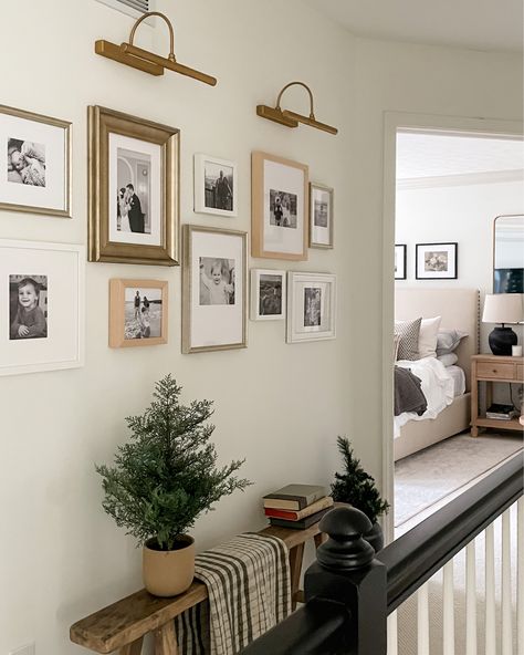 Art With Lighting Above, Gallery Lights Wall, Gallery Wall With Small Frames, Gallery Wall For Large Wall, Framed Photographs On Wall, Wall Sconces Hallway Pictures, Entry Table With Gallery Wall, Tasteful Gallery Wall, Gallery Wall With Shelf Living Room