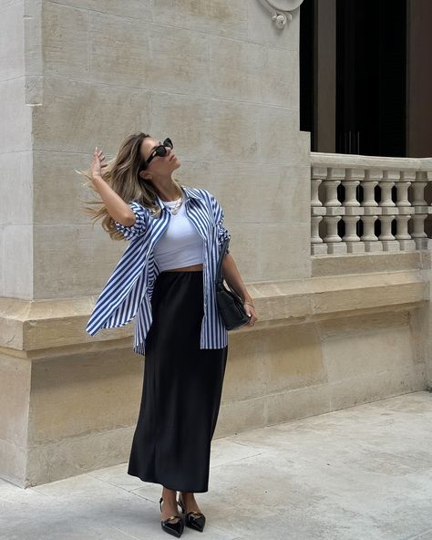 Styling a blue striped shirt for the office paired with a black silk skirt and massimo dutti slingbacks #springoutfit #outfitinspiration #stripedshirt #avenuethelabel #silkskirt #slingback #portuguesegirl #stylingideas Blue Striped Linen Shirt Outfit, How To Style Blue Striped Shirt, Striped Blue Shirt Outfit, White And Blue Striped Shirt Outfit, Shirt With Skirt Outfit, Random Outfits Ideas, Blue And White Striped Shirt Outfit, Striped Shirt Outfits, White Striped Shirt Outfit