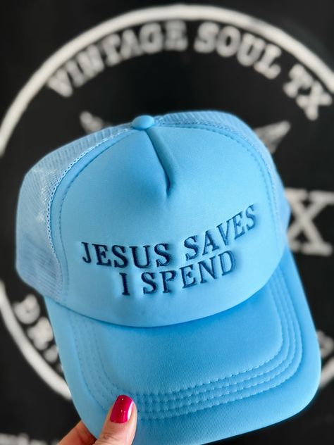 Show off your sense of humor with this "Jesus Saves, I Spend" embroidered trucker hat. Featuring dark blue text on a light blue foam design, the tone-on-tone embroidery adds a subtle touch of style while keeping things playful. Perfect for adding a witty twist to your outfit, this hat is sure to turn heads and spark a laugh or two. Foam Trucker Hat Embroidered Lettering Adjustable hat for perfect fit Embroidered Lettering, Blue Text, Jesus Saves, Adjustable Hat, Sense Of Humor, Your Outfit, Trucker Hat, Dark Blue, Perfect Fit