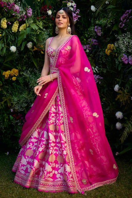 Buy Fuchsia Lehenga And Blouse Raw Silk Patchwork Embroidered Floral Set For Women by Shyam Narayan Prasad Online at Aza Fashions. New Fashion Lehenga, Silk Lehenga Dupatta Draping Style, Lehenga Without Cancan, Pink Lehenga For Haldi, Organza Dupatta Draping Styles, Lehnga Dupatta Styling, Floral Lehenga Designs, Lehenga From Saree, Blouse Design For Lehenga