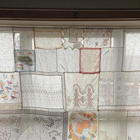 Roberta Cummings on Instagram: "I recently bought some telescopic sprung voile curtain poles meaning I could finally start putting up the patchwork net curtains I made last summer. This one was made using vintage handkerchiefs and scraps of broderie anglaise I’ve collected over the years, simply overlaid and stitched together   [image: interior photo of a living room looking out the window. There is a sheer patchwork curtain made with tourist hankies, pieces of lace and sheer white material] • • #SheerPatchwork #PatchworkCurtain" Sheer Patchwork, Patchwork Curtains, Net Curtains, Voile Curtains, Looking Out The Window, Vintage Handkerchiefs, Curtain Poles, Interior Photo, White Material