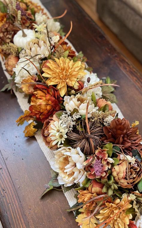 ** Made to Order ** 3 ft or 4 ft garland This warm, fall garland is dense with autumn flowers and foliage in colors of creams, golds, rusts and browns!  This is a statement fall centerpiece for your home or other decor needs!  Peonies, dahlias, mums, hydrangeas, fall heather and grasses, wildflowers, berries and cream pumpkins and gourds are only some of the many beautiful elements that make up this garland!  Use all Autumn long or for a special Thanksgiving dinner, on a mantel, as a table runner, hung on a wall or railing, to bring the warm colors of fall harvest décor to your home.   ** As this is a MADE TO ORDER item, some exact elements shown in the pictures may not be available and will be substituted with similar items, the look and colors will be the same. Please allow at least 1-2 Rustic Floral Decor, Rustic Garland, Faux Garland, Fall Wedding Arches, Thanksgiving Garland, Wedding Swag, Wedding Runner, Floral Runner, Fall Floral Arrangements