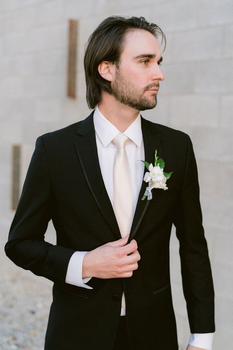 Groomsmen Attire Black Suit Champagne Tie, Groomsmen With Champagne Ties, White Tie Black Suit, Groom Champagne Tie, Black Suit Men Champagne Tie, Black And Champagne Suit Men, Black Suit Ivory Tie Wedding, Black Tux With White Tie, Black Suit Cream Tie