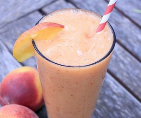 This is the perfect refreshing drink to have on a warm summer's eve. The blend of peaches and lemonade....your taste buds will dance! Lemonade Slush, Wine Slush, Slushy Drinks, Slush Recipes, Adult Beverages Recipes, Frozen Peaches, Peach Wine, Peach Drinks, Easy Summer Cocktails