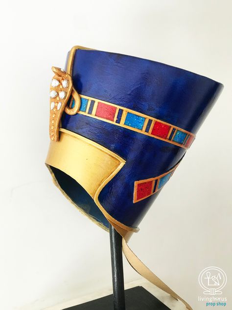 The famous blue flat top crown worn by the timeless beauty, Queen Nefertiti, Great Royal Wife of the 18th dynasty pharaoh, Akhenaten. She was made famous by her bust, now in Berlin Pharaoh Crown, Egyptian Queen Costume, Egyptian Headdress, Headdress Art, Egyptian Mask, Ancient Egypt Projects, Egyptian Party, Egypt Queen, Crown Headdress