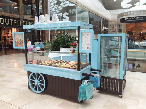 Lola's Cupcakes on Twitter: "As if our recent opening wasn't enough...we've now opened our cupcake cart doors in @westfieldlondon 💕… " Cupcake Cart, Jewelry Display Cases, Trophy Cabinets, Gerobak Dorong, Juice Bar Design, Wall Display Case, Bike Food, Pedestal Display, Retail Display Cases