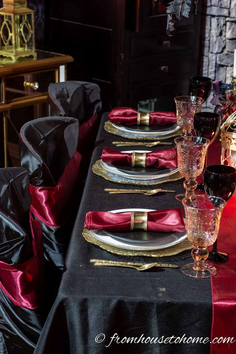 This red, black and gold table setting is gorgeous! It would be beautiful for a gothic wedding or a Halloween dinner party. #fromhousetohome #tablescape #tablesetting #partyideas #halloween #falldecor Black And Gold Table Setting, Gold Table Centerpieces, Harry Potter Table, Black And Gold Table, Lace Candle Holders, Victorian Party, Halloween Dinner Party, Lace Candles, Halloween Table Settings