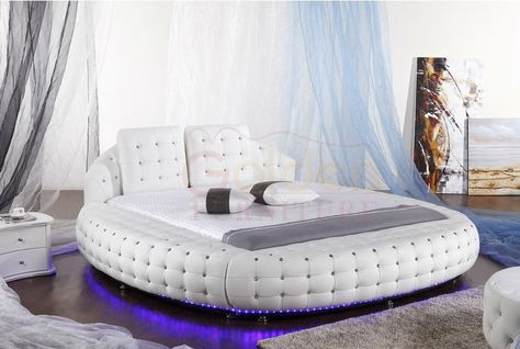 white round bed with purple lighting undernearth Italian Bedroom Decor, Circular Bed, Aesthetics Bedroom, Bed Minimalist, Full Size Bedroom Sets, Bed Upholstery, Bed Styles, Bathrooms Decor, Round Bedroom