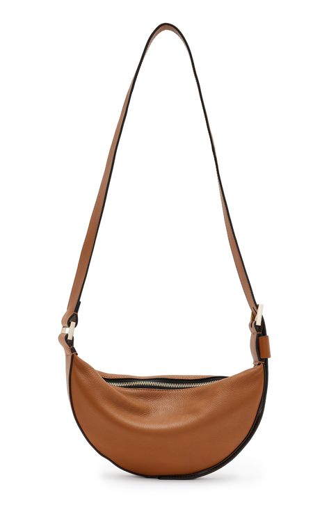 Like a first-quarter moon, this leather crossbody bag with an adjustable strap lends a subtle glow to any outfit. Top zip closure Adjustable crossbody strap Interior zip pocket; two card slots Flat base for stability Lined Leather Imported Leather Crossbody Bag, Leather Crossbody, Adjustable Straps, Zip Pockets, Crossbody Bag, Nordstrom, Leather